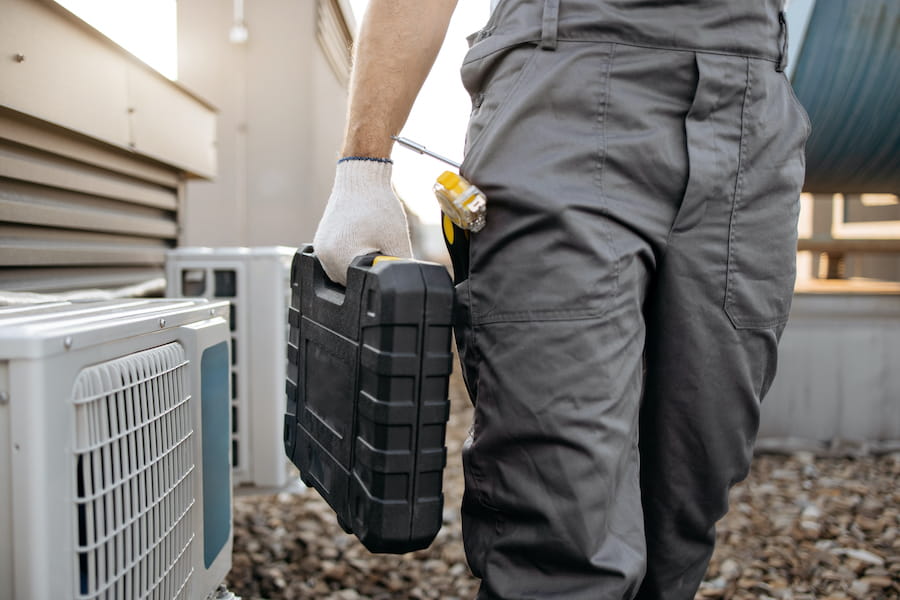 North Alabama Heating & AC technician evaluating residential duct system