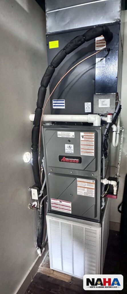 Upflow gas furnace installed in a closet