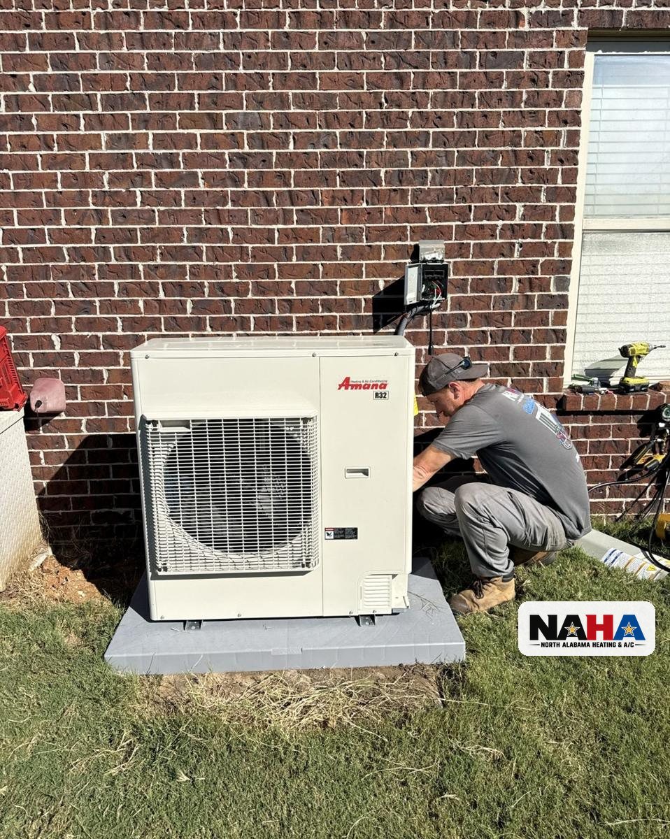New Amana 19 SEER2 heat pump installed on a new pad at a South Huntsville home by a North Alabama Heating and A/C technician
