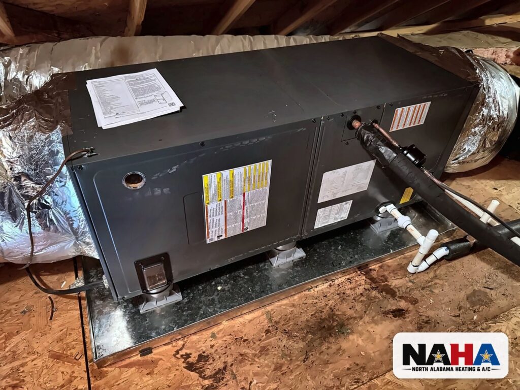 New horizontal HVAC unit on an attic platform
