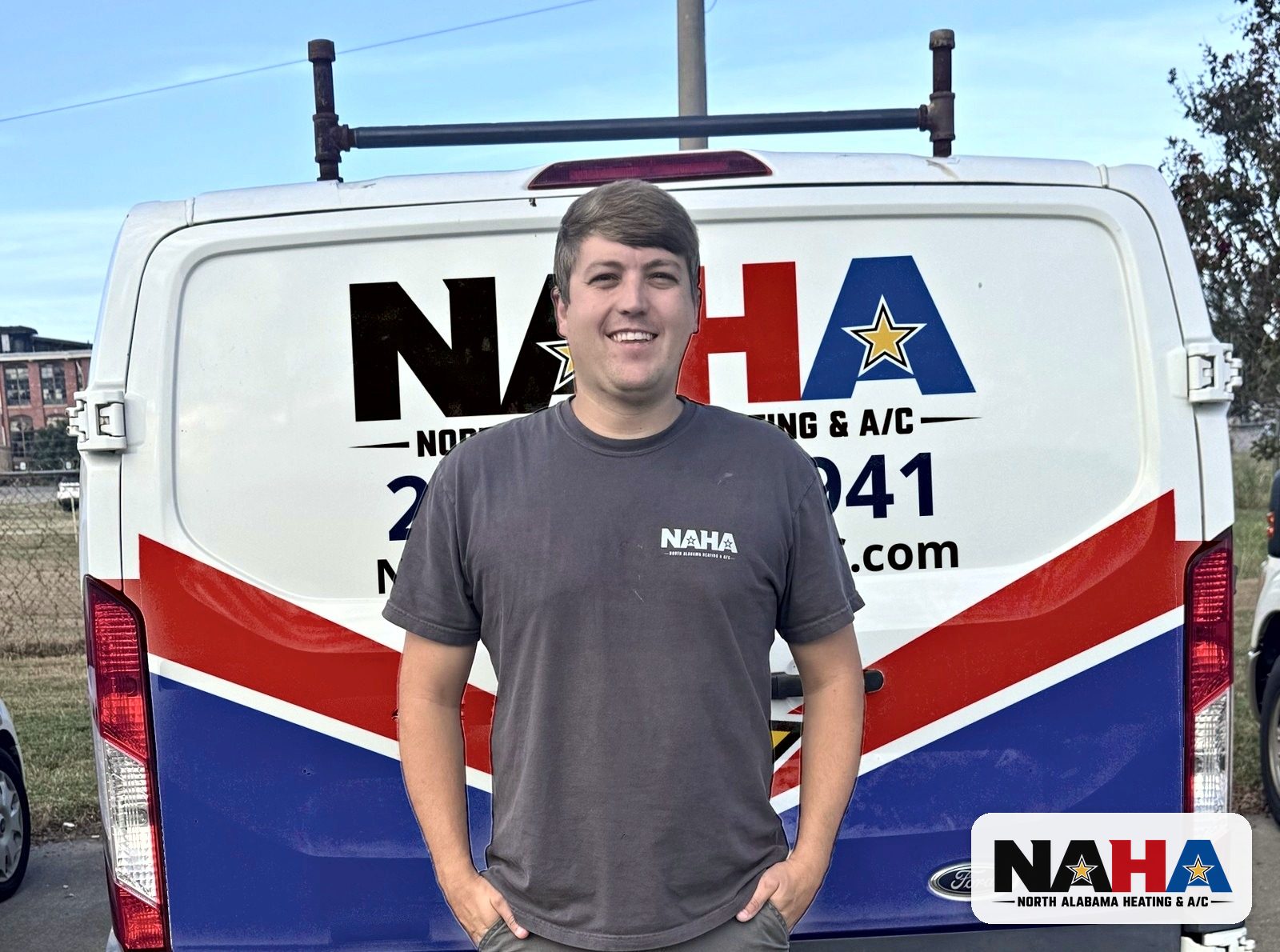 Steven Watwood, owner of North Alabama Heating & A/C, with a NAHA service van in Huntsville, AL